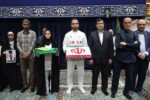 بدرقه پرچمداران کاروان «فرشته‌های میناب» در رواق الذکر حرم رضوی